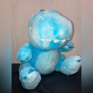 Blue dinosaur plushie